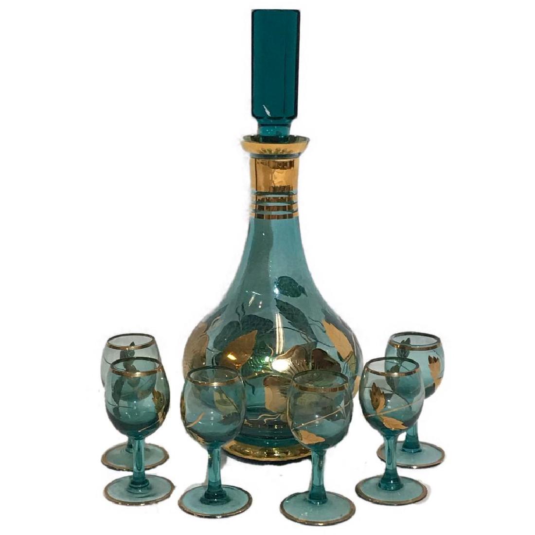 Antique Bohemian Czech Teal Green with Gold Overlay: Antique Bohemian Czech teal green with gold overlay flower design glass liquor decanter set, includes 6 cordial stemmed glasses. Decanter marked, decanter measures 12" high.