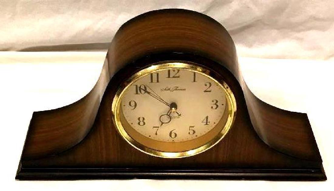 Seth Thomas Mantel Clock: Seth Thomas Mantel Clock. This clock has a battery operated movement. It has not been tested. It measures approximately 8" high, 17" wide, 4" deep.