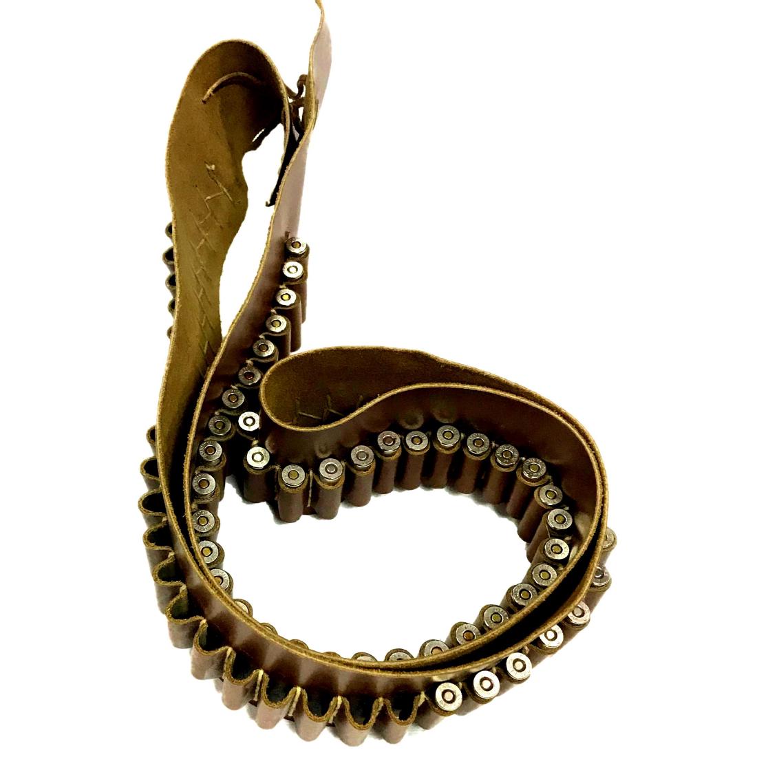 Hand Crafted Leather Bullet Bandolier Belt: This vintage leather ammo bandolier was handcrafted in Mexico. It measures approximately 56" long. It's a great piece to add to your old west look.