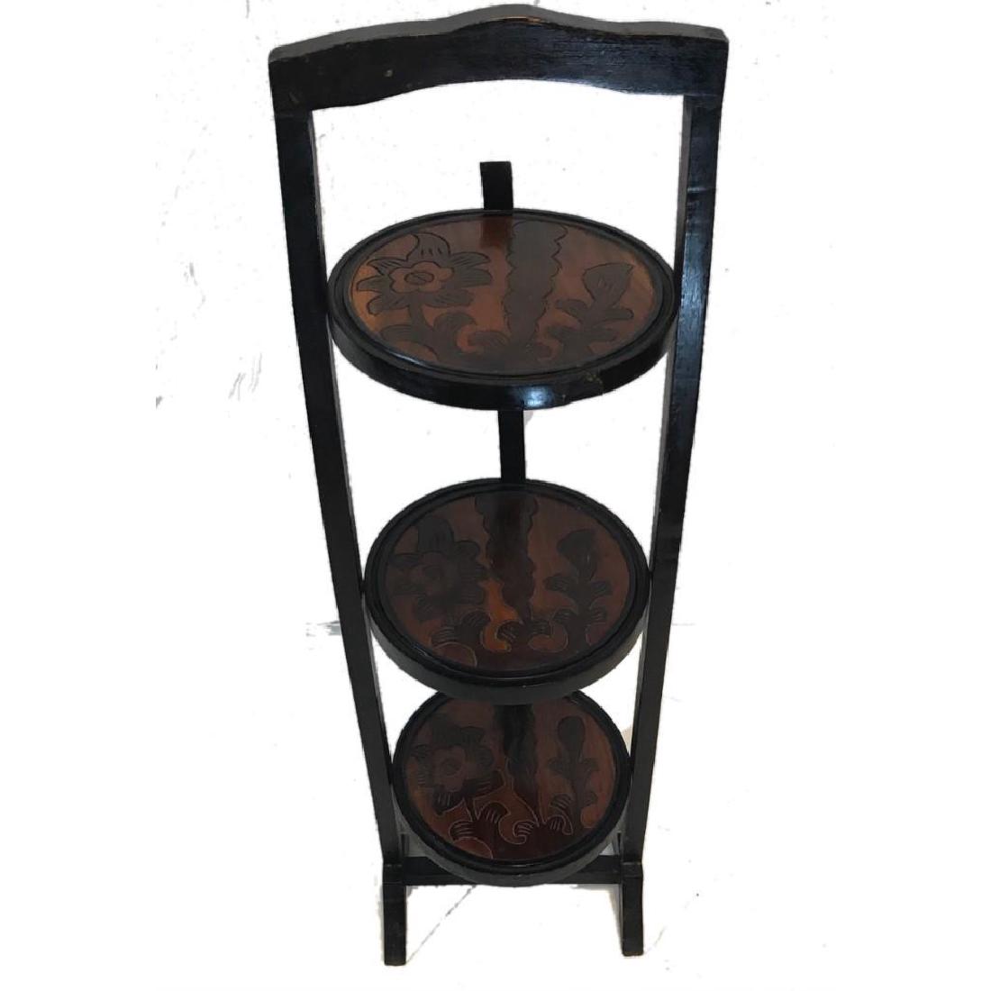 Vintage Three Tier Pie Shelf: A vintage wood pie stand with separate levels for 3 pies. The wooden shelves feature hand carved embellishment. The pie shelf measures approximately 34" tall x 10" wide.