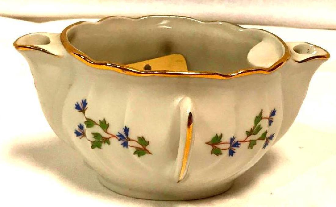 New Orleans Souvenir French Gravy Boat: This is a very neat, old gravy boat made in France and purcased in New Orleans. It has two spouts one lean, one fat.