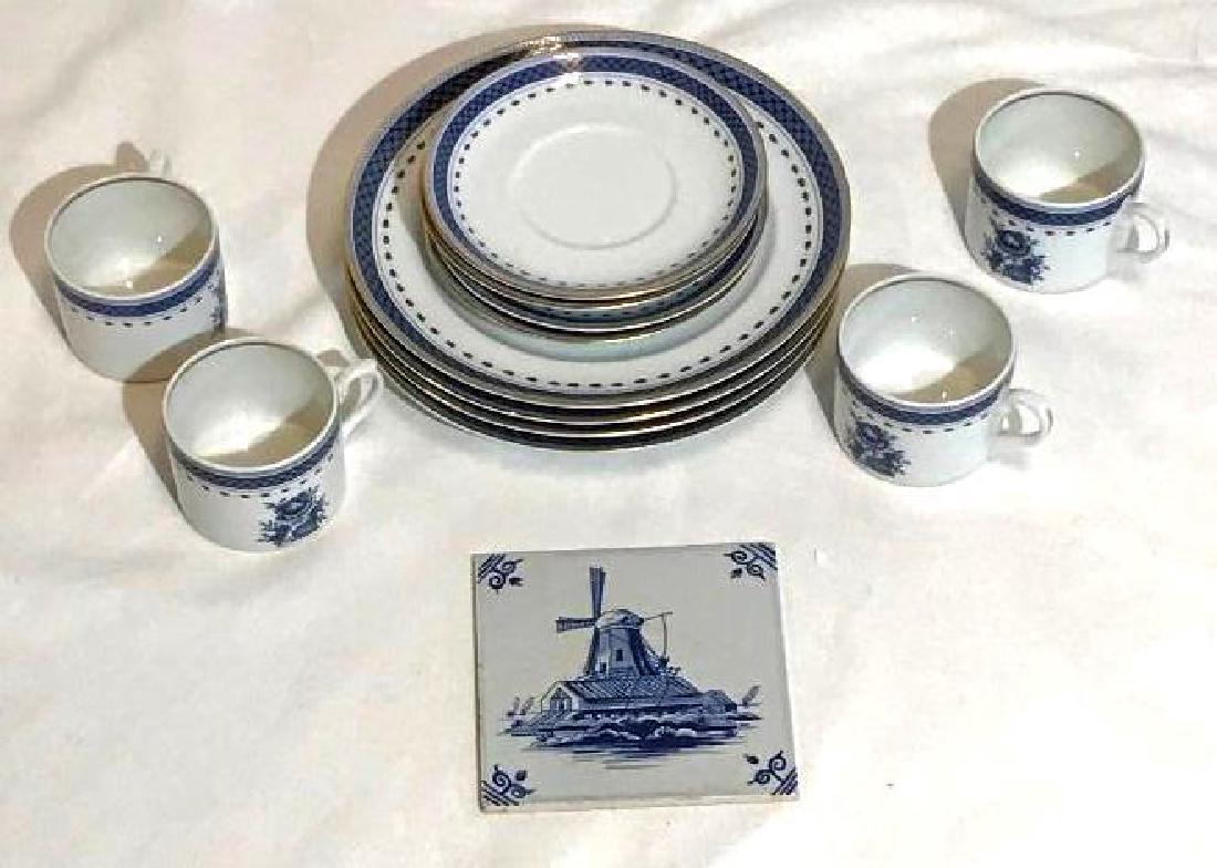 Lot of 16 pc Mottahedeh China & Delft Trivet: 4 flat cups 2.25" €‹4 saucers €‹4 salad plates 8.5" 1 Delft Blue Windmill Design Tile Trivet Wall Hanging Hand Painted in Holland, measures 5" x 5" Description: Blue Floral Center, Blue Bor