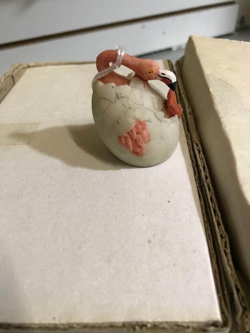 24 Resin Flamingo Egg Hatchling Figurines: 24 cute little pink flamingos hatching from an egg. They measure approximately 2ï¾” tall by 1.5ï¾” across.