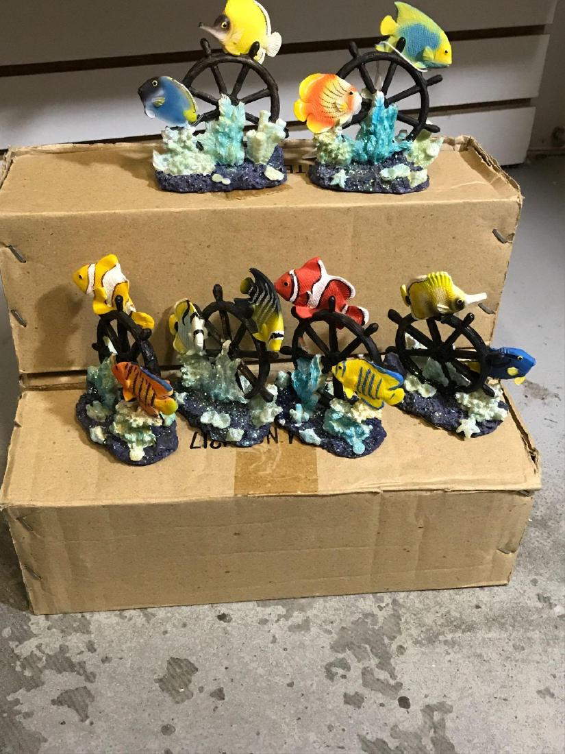 24 Resin Tropical Fish on Ships Wheel: 24 tropical fish swimming around a shipï¾’s helm. They measure approximately 3.75ï¾” tall by 4ï¾” across.