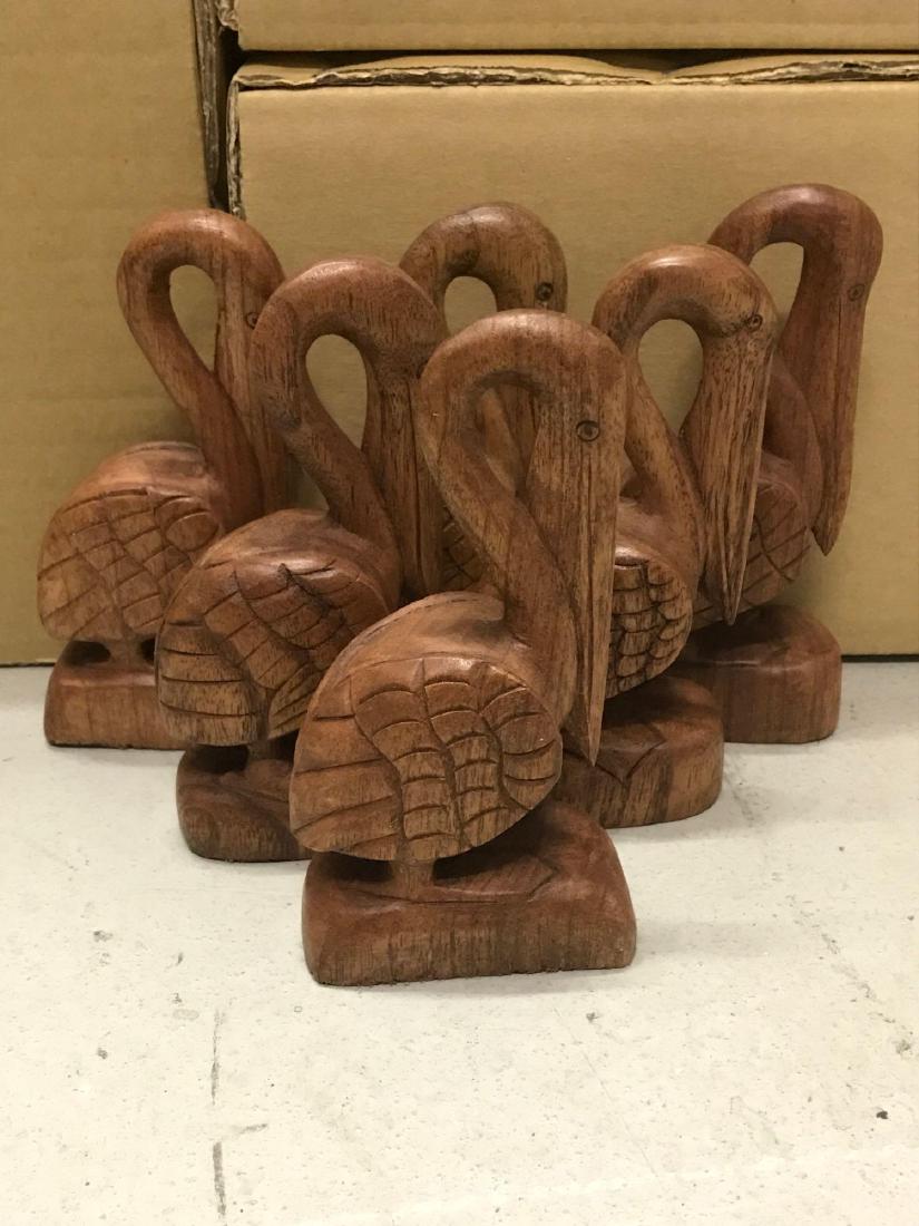 6 Carved Pelican Tabletop Figurines.: 6 pelican figurines. Carved in Indonesia. Approximately 6.5â€ tall.