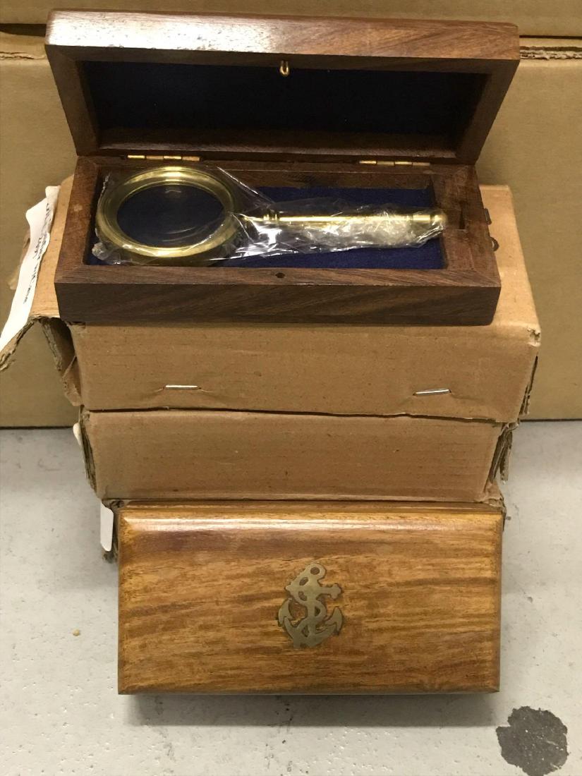 5 Magnifying Glass in Wood case: 5 brass magnifying glass in wood case with gold anchor inlay.