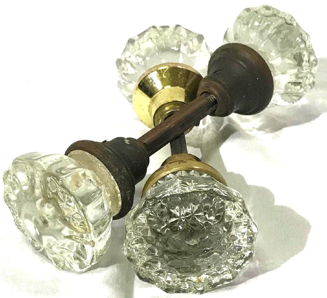 Antique Crystal Door Knob: 2 Antique glass doorknobs with brass fittings.