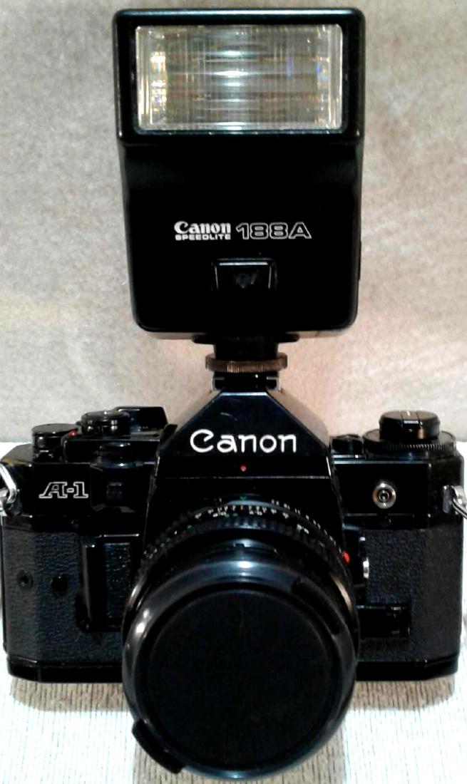 Canon A-1 35MM SLR Camera: Here is 1 Vintage circa 1979 Canon A-1 SLR Camera body and 1 Canon FD 50mm 1:1.8 The following Information is courtesy of the Canon Museum: The A-1 was the top-of-the-line A-series camera. (The AE-1 w