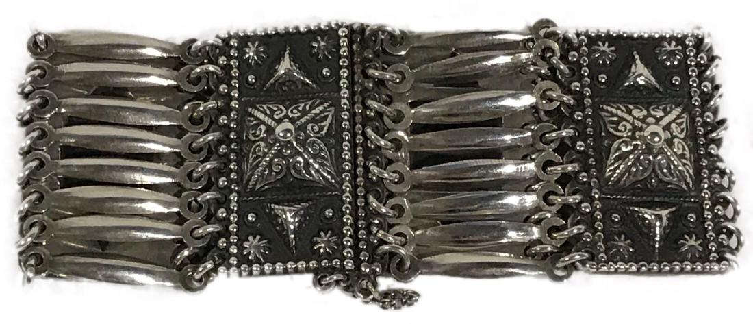 Vintage Sterling Silver Bracelet From Mexico: This is a fun bracelet purchased in Mexico many years ago. You can se the influence of the Mayan pyramids in the relief. It measures approximately 8" around and has a total weight of 78.36 grams.