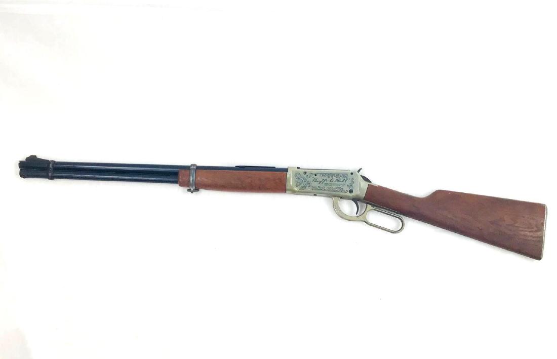 Buffalo Bill Model 3030 Daisy BB Gun: 1 Vintage 1960-1970â€™s Daisy Heddon BB gun, manufactured in Rogers Arkansas. Buffalo Bill Scout Model 3030. It has a woodgrain plastic stock and fore-grip. Clean action, and nice inlay on the me