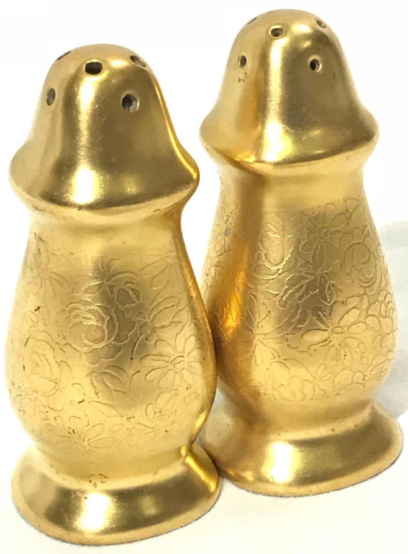 Gold Rose and Daisy Salt and Pepper Pickard: One salt and pepper shaker set made by pickard. They have the rose and daisy pattern encrusted in the gold finish. They measure approximately 2.5â€ tall. There are no chips, cracks, or major scratc