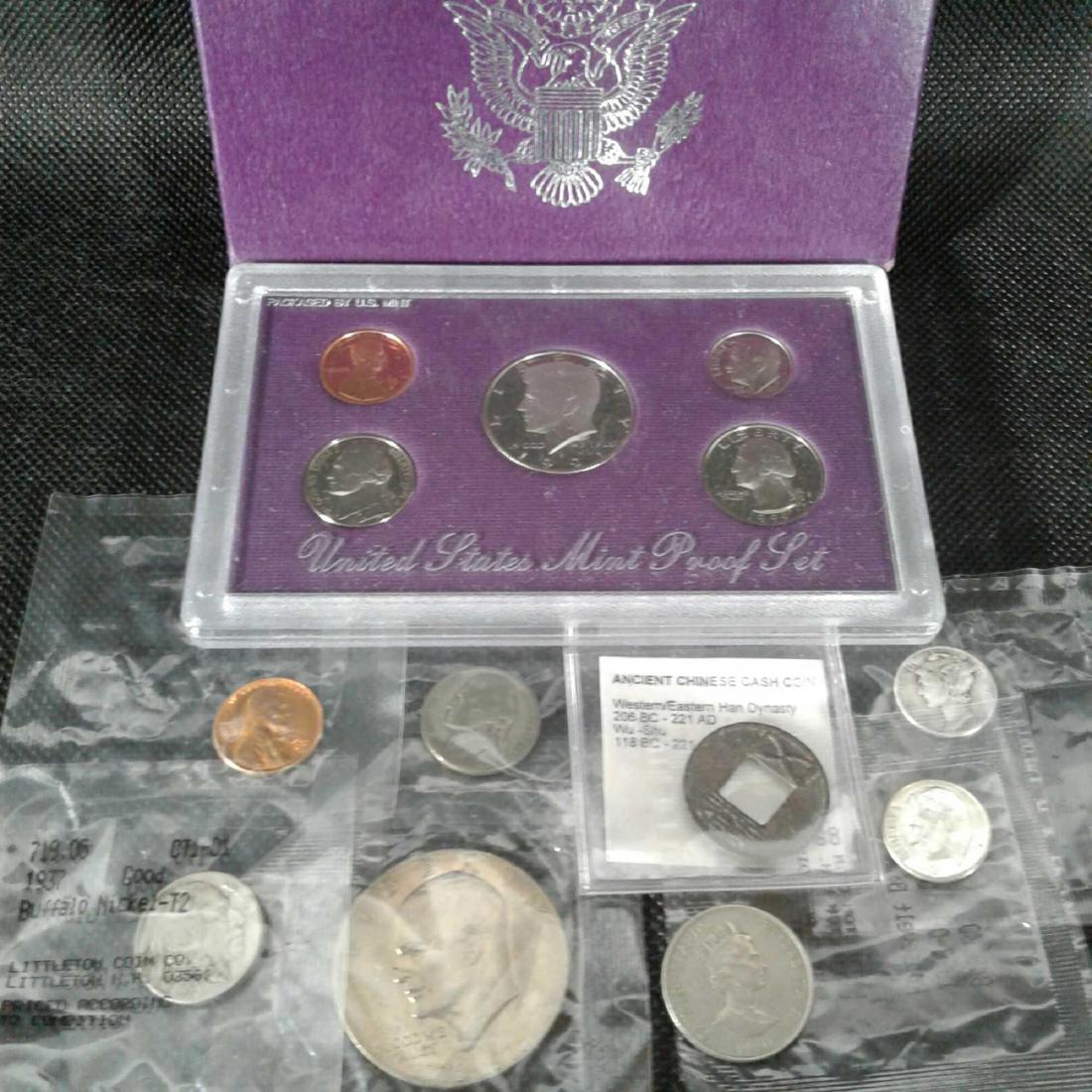Coin Collection: This coin collection consist of a United States Mint Proof Set - 1991 with a "Certificate of Authenticity" and original box, aÂ 1776-1976 Eisenhower Dollar, a 1945 Jefferson Nickle, a 1963 Roosevelt