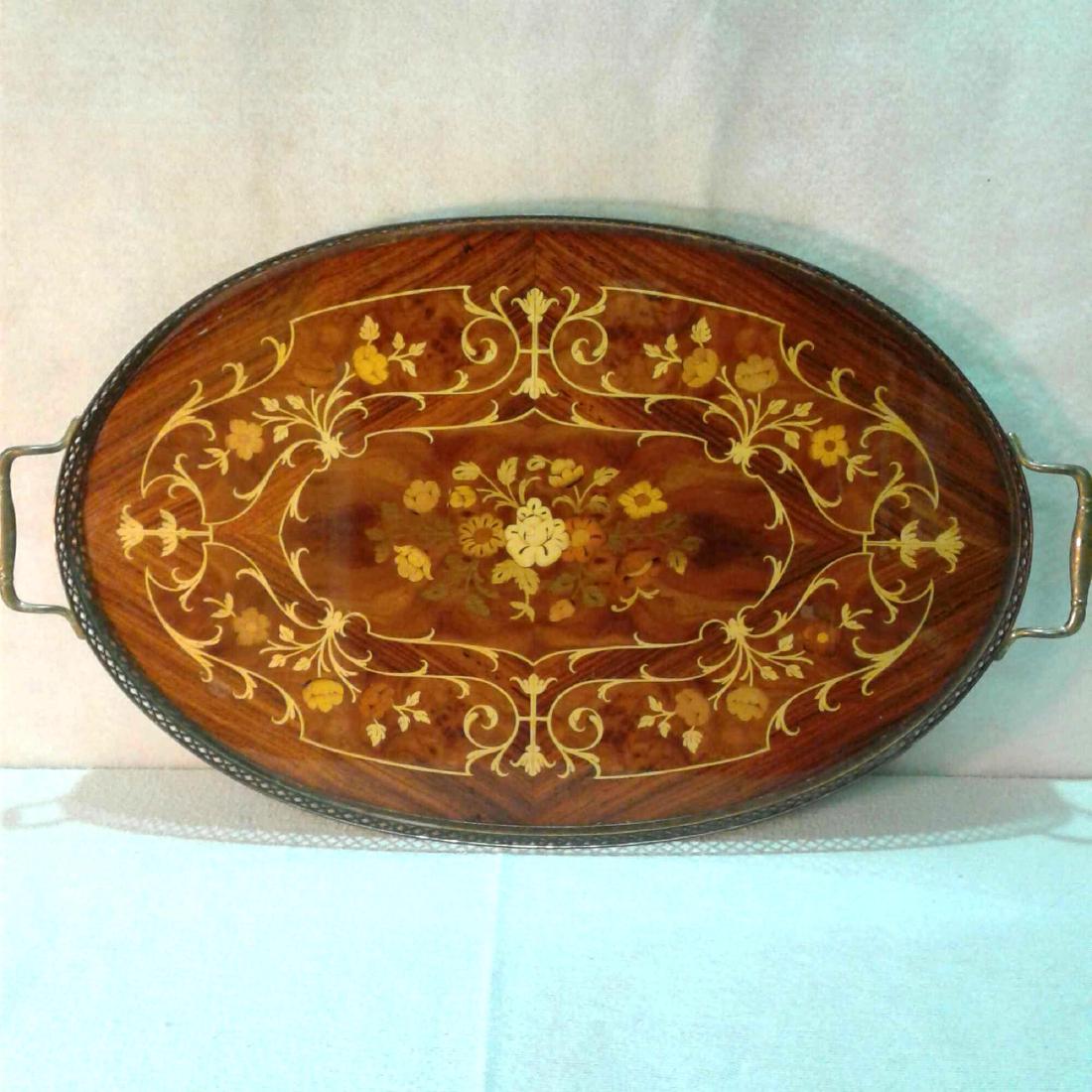 Vintage Serving Tray: Â A French provincialÂ style serving tray that is made with stain finished and gloss covered wood with brass trim and handles very light surface scratches and the brass could use a good polish.Â�