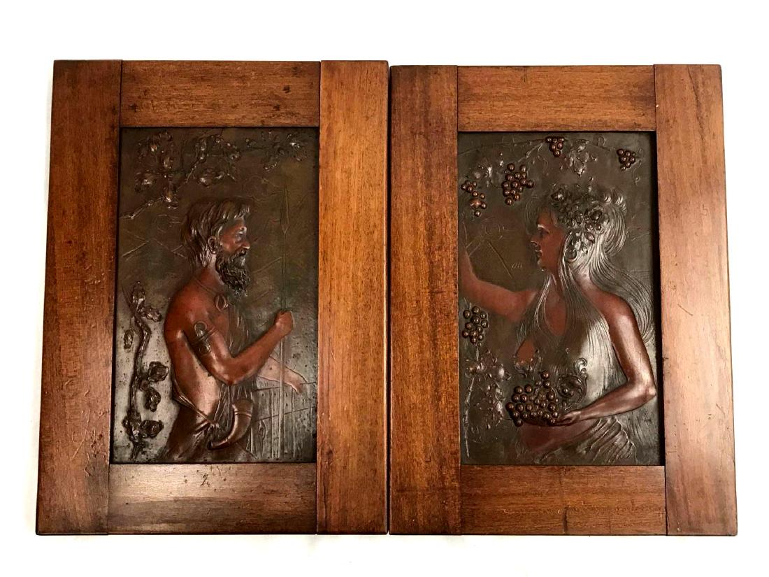 2 Vintage Hammered Bronze Art Pieces: 2 Vintage Framed Bronze Art Pieces. A male and a female show under a fruit tree, possibly Adam and Eve or an Egyptian couple considering the Pyramids in the back round.Â Measures approximately 1.25�