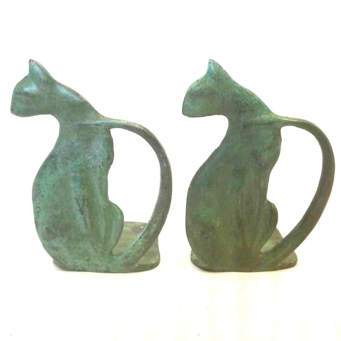 Stylized Art Deco Cat Bookends: Stylized Art Deco Cat Bookends; these two sitting cats have a green finish for a lovely aged patina appearance. They show a very tasteful art deco style and are in excellent condition. Each bookend me