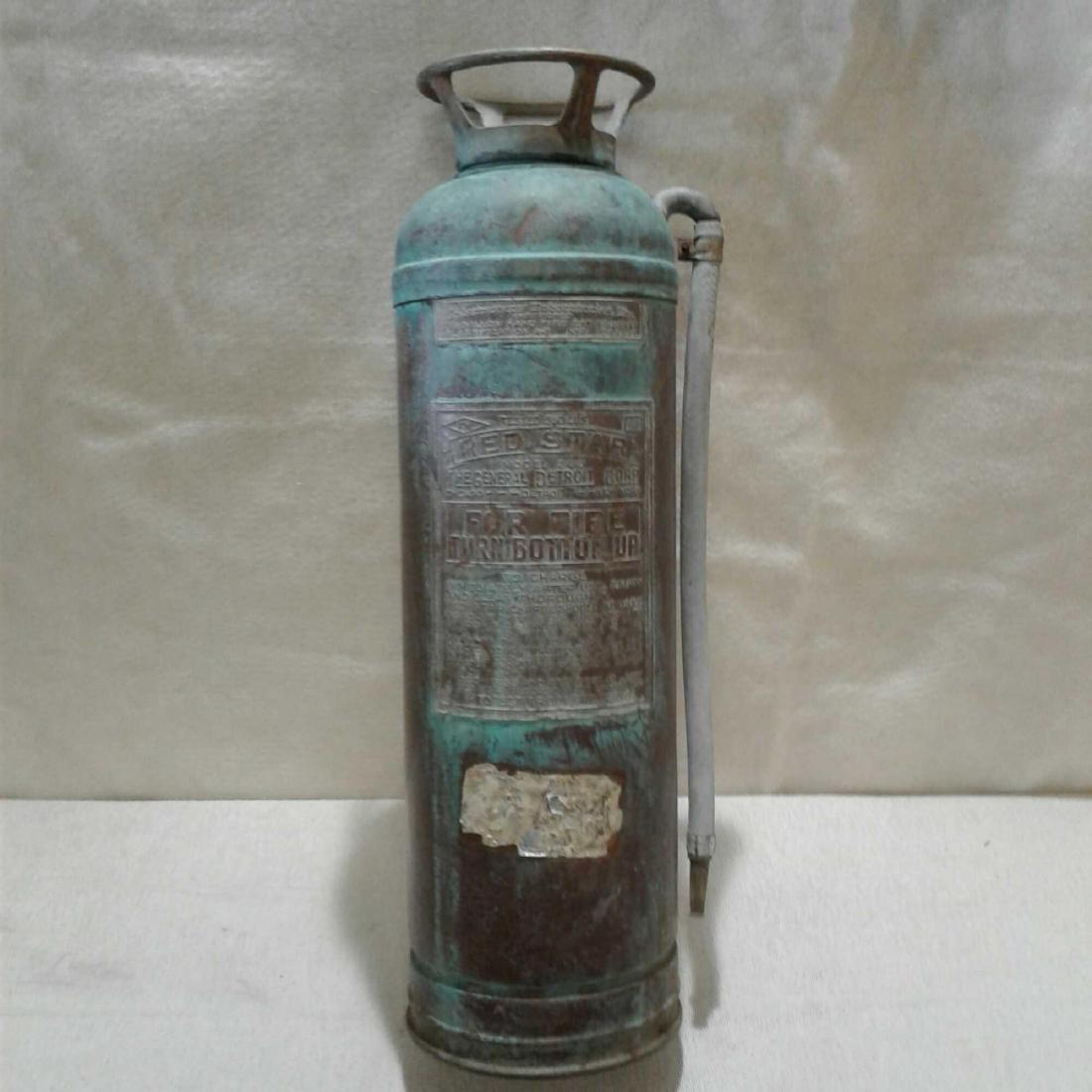 Red Star Copper Extinguisher: Red Star Fire Extinguisher A1, Modelï¾ 303. Made by The General Detroit Corp. 2.5 Gallon hand fire extinguisher. This item is tarnished and may polish up good, and has a couple dents and scratches.
