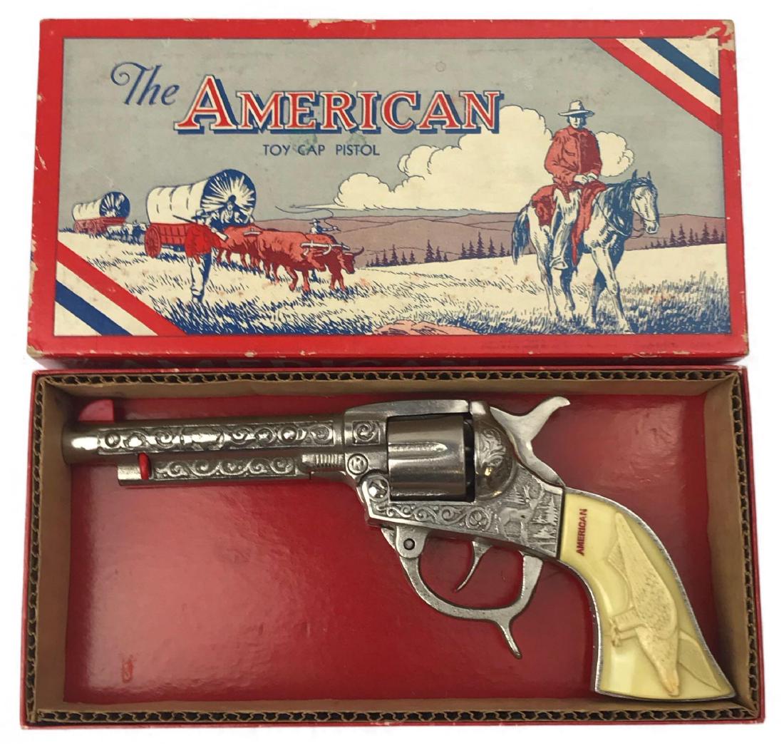 Kilgore American Vintage Cap Gun: Kilgore American Vintage Cap Gun; this is "One No. 105 Americanï¾ Toy Cap Pistol" as noted on the included original packaging. A very fine example of a quality made toy. The frame is engraved with