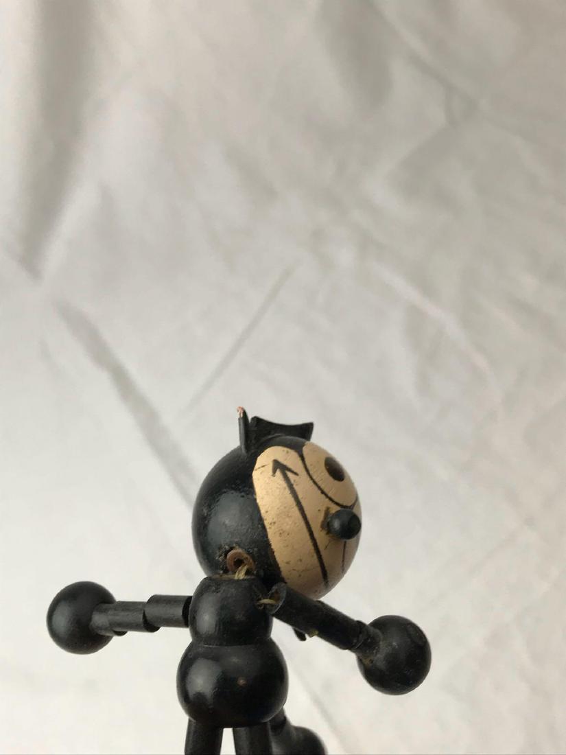 Cast Lead Felix the Cat Figurine: Cast Lead Felix the Cat Figurine; a nice piece showing the fun Felix the Cat in his signature walk.ï¾ This little figurine is embossed on the face of the base "Felix". It is marked on the bottom sh