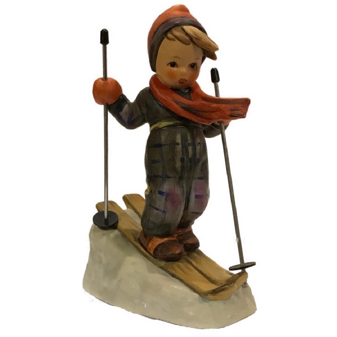 Goebel Hummel Skier Figurine #59: Vintage Goebel Hummel Skier #59 Figurine, TMK-6 (1978-1991), Missing Bee Back Stamp made in W.Germany. This skier measures 5.25" tall, 2.5" wide and 4" long.