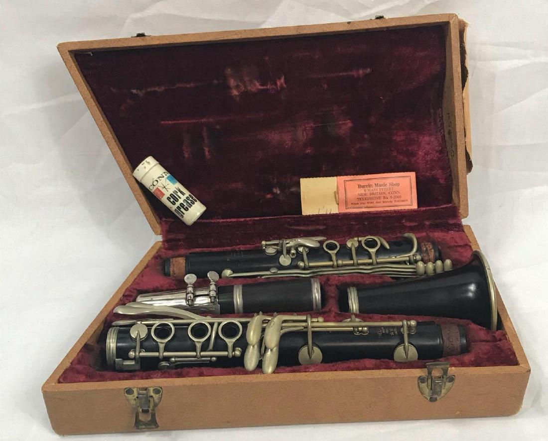 Vintage French Made Clarinet: Vintage French Made Clarinet, marked "Melody, Paris, France", appears complete and in excellent condition, in clothed wrapped wooden carry case with velvet lining, includes tube of cork grease and ree