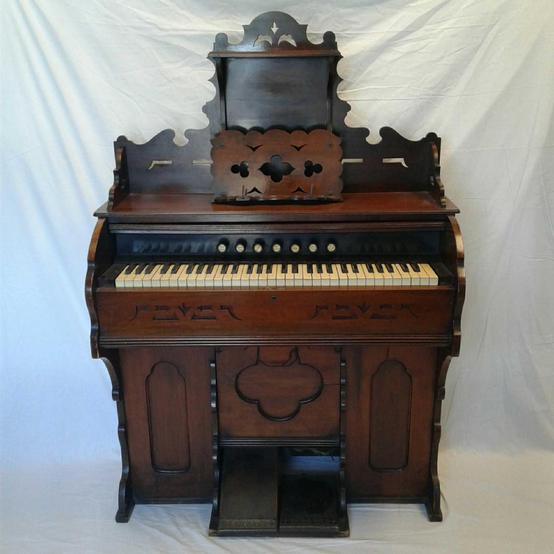 Antique Pump Organ: Antique Pump Organ, beautiful example of these instruments, framed in walnut with fine detail, finish is bright and unblemished with very slight wear at the base, condition is excellent for the age of