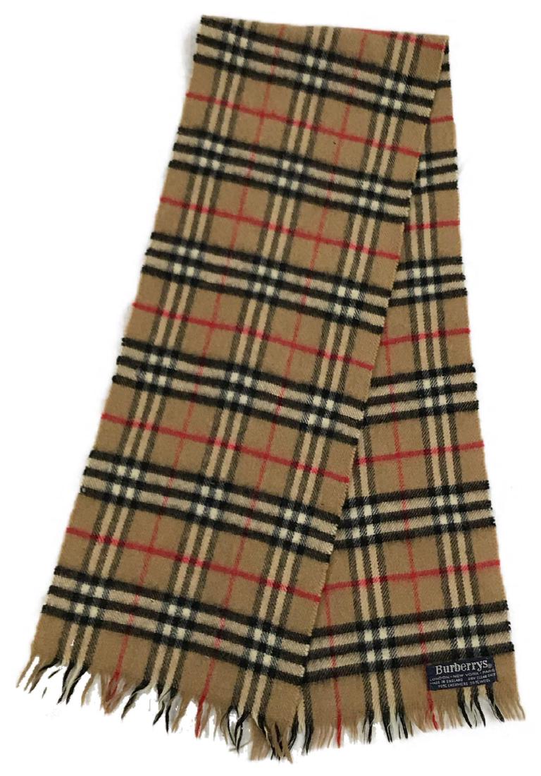 Vintage Burberry Scarf: A beautiful and soft Burberry cashmere/wool blend scarf. This scarf is in excellent condition and measures 8" W x 46" L.