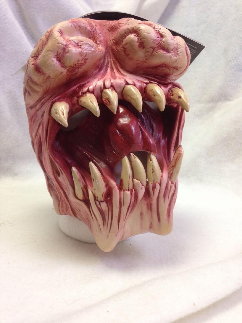 NOS-latex Halloween mask- BRAIN EATER: Here is an unused and ready to wear latex Halloween mask from teh folks at Zagone Studios. This quality creature features the look of a brain eater. As gross as this is, you will have the time o