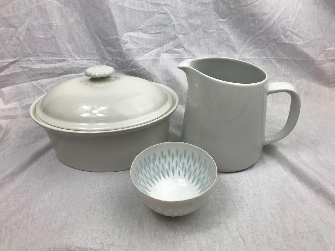 3 Pieces of Arabia of Finland Cookware: 3 Pieces, Arabia of Finland Cookware; all in clean and soothing white finish. Arabia is a pioneer of Finish Design, known for beauty, quality and practicality. This lot includes 1) Casserole Dish with