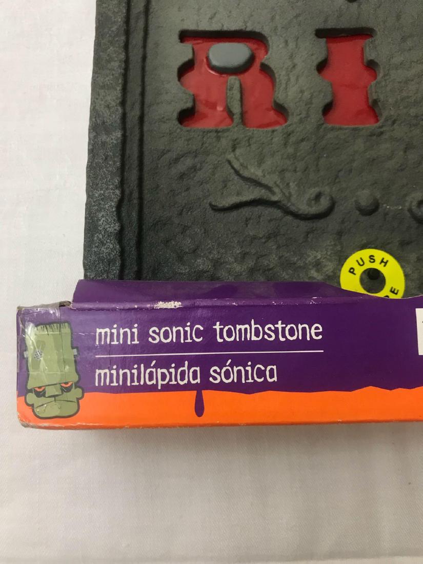 NOS - RIP - Halloween Prop - Mini Sonic: Need a scary noise making tomb stone for the Halloween party? IF so, this is it! Perfect for the office or front door trick or treat area. Size: 12". Battery powered and makes scary sounds.