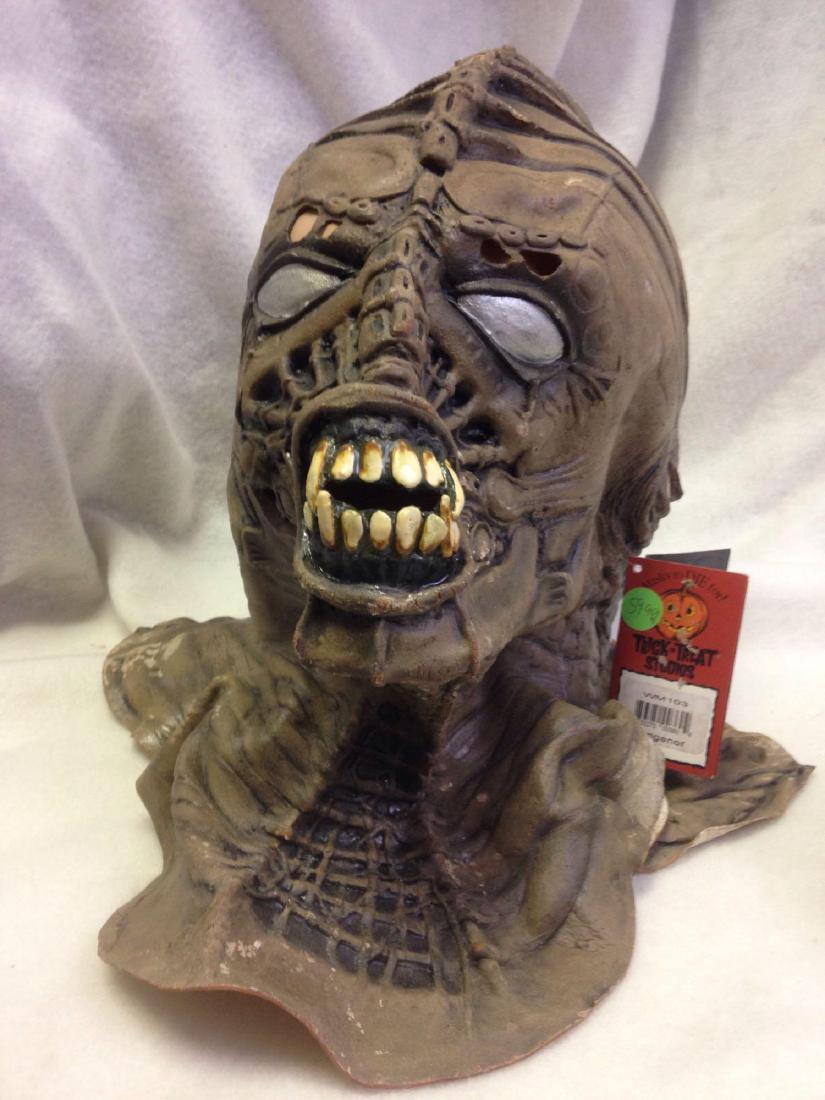 NOS - Halloween Latex Mask - Syngenor - Alien: Want to be a monster Alien creature this year? If so why not Syngenor or another synthetic genetic organism? This Syngenor mask is new old stock and is ready to wear this Halloween. Size: Adult.