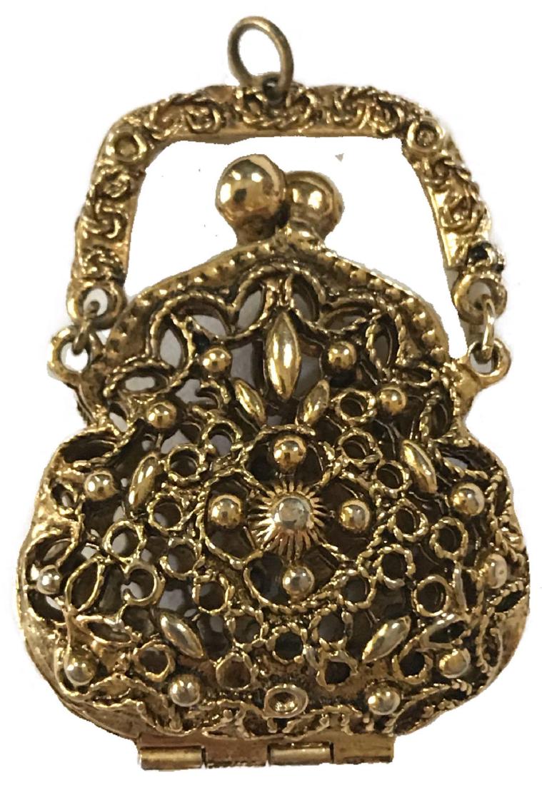 Victorian Revival Coin Purse Pendant: Victorian Revival Coin Purse Pendant- This intricately ornate coin holder is fashioned in the shape of an adorable coin purse believed to be used mainly as a wallet when the main source of currency wa
