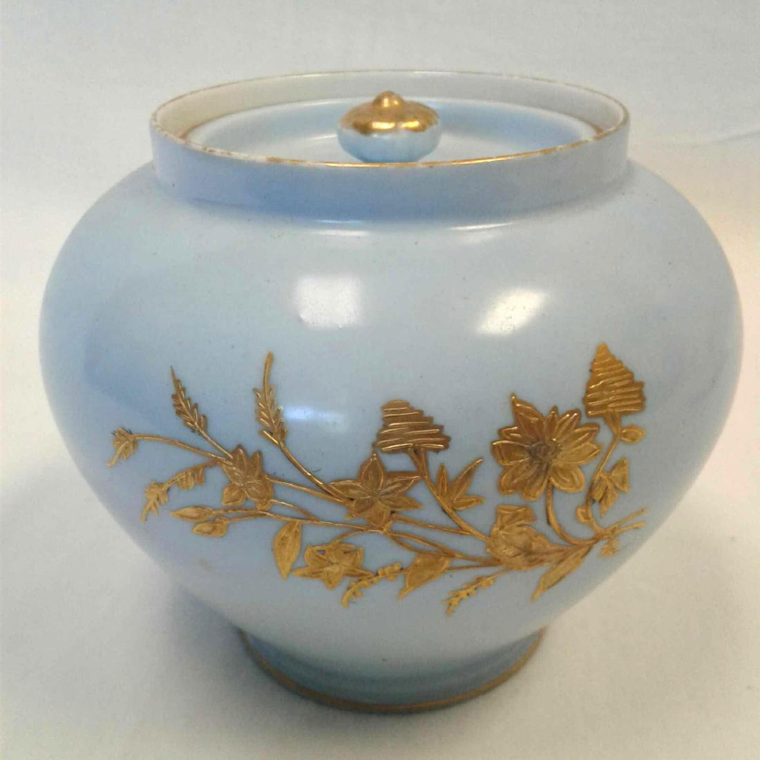 Limoges Tobacco Snuff Jar: Limoges Dish with Lid, lovely powder blue with applied gold colored floral design, very good condition, shows some wear of gold accent trim on top rim, marked "AK Limoges France", measures 5" H x 6" D