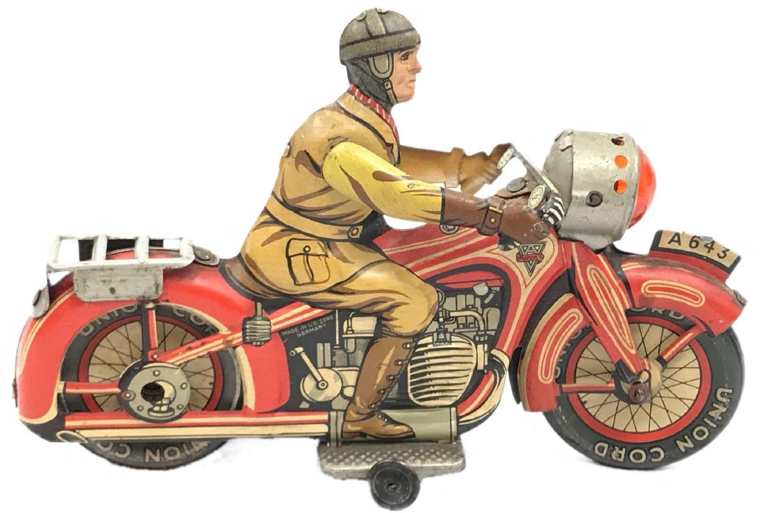 Rare Vintage Tin Type Litho Toy Motorcycle by Arnold: Vintage Tin Type Litho Toy Motorcycle by Arnold; this is a rare piece marked "Made in US Zone Germany". It is in very good condition, it is noted that the spring in the friction motor appears to be sp