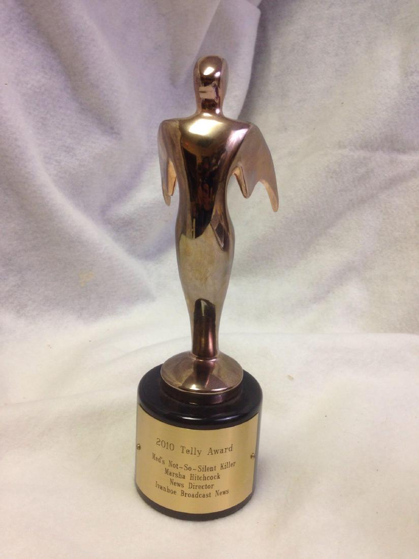 2010 Telly Award: The Telly Awards honor excellence in video and television across all screens. Here is an award dated 2010. It was presented to Marsha Hitchcock of the Ivanhoe Broadcast News for "Med's Not - Silent Ki