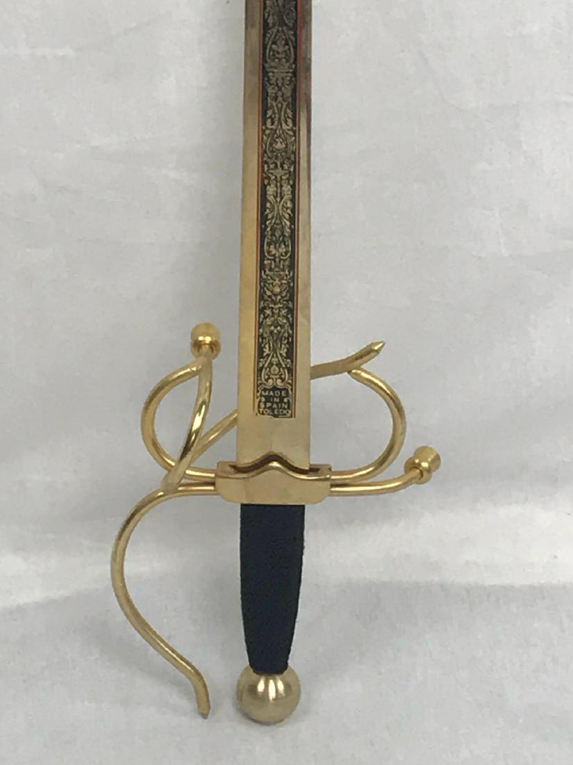 Colada Medieval Sword of El Cid by Marto: Colada Sword of El Cid by Marto; from the world famous Marto Swords of Toledo, Spain. This sword is double-edged Toledo steel blade, with gold colored etching on its upper part. It is marked "Made i