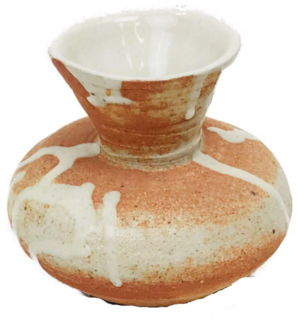 Hand Thrown Fat Lava Pottery Vase Signed: Here is one hand thrown pottery vase with a fat lava style glaze. It is signed on the bottom. It measures approximately 4" tall and 4.25" across at its widest point. It appears to be free of def