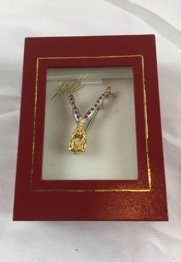Erte Alphabet Brooch "Y", New in the Box: Erte Alphabet Brooch "Y", New in the Box a gold plated sterling brooch with Swarovski red crystals in Art Deco style. New condition.