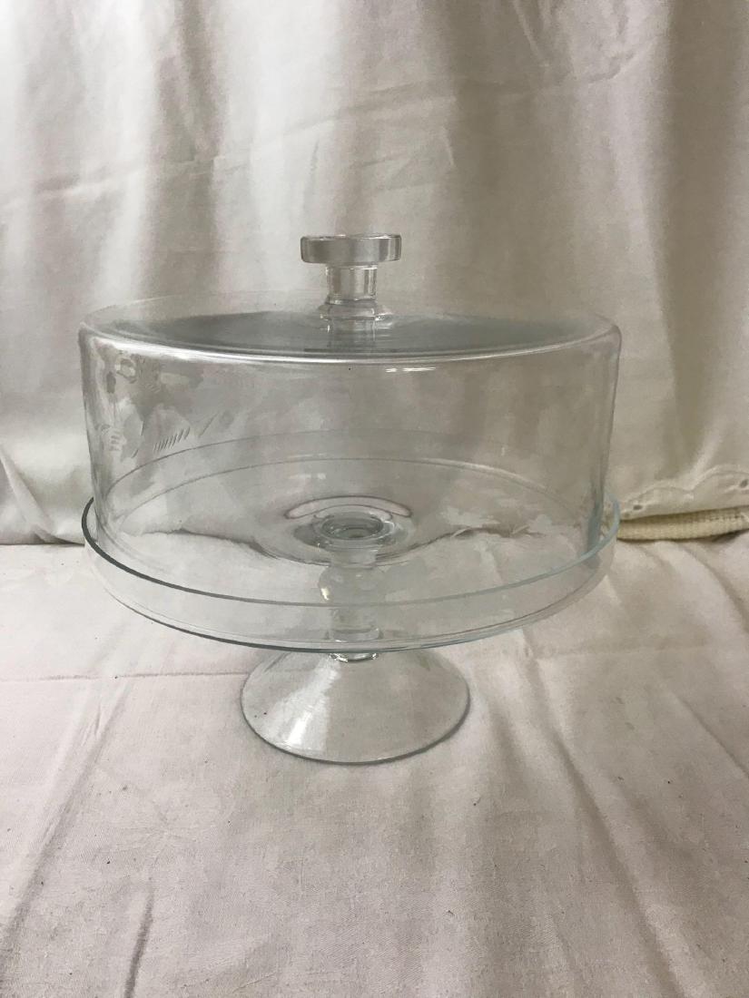 Elegant Etched Blown Glass Dome Covered Footed Pedestal: Elegant Etched Blown Glass Dome Covered Footed Pedestal Cake Stand Has a minor chip on the rim. Measures at approximately 10" H x 10" D.