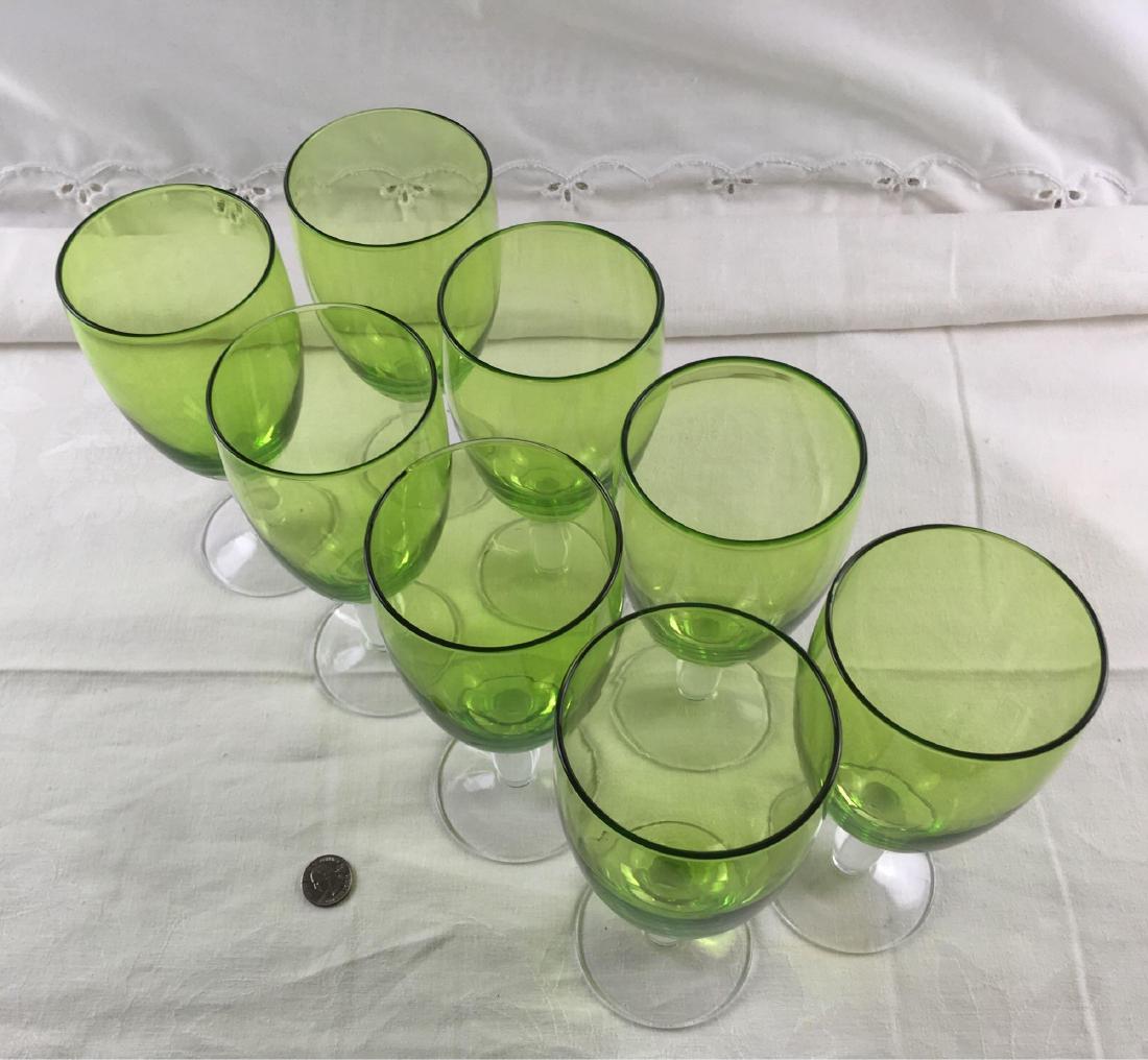 Green Blown Glass Goblets, 8 Red Wine, 5 White Wine: Green Blown Glass Goblets, 8 Red Wine, 5 White Wine a nice collection of drinking glasses. All show a green glass bowls and clear stems. All goblets are in excellent condition, the red wine goblets me