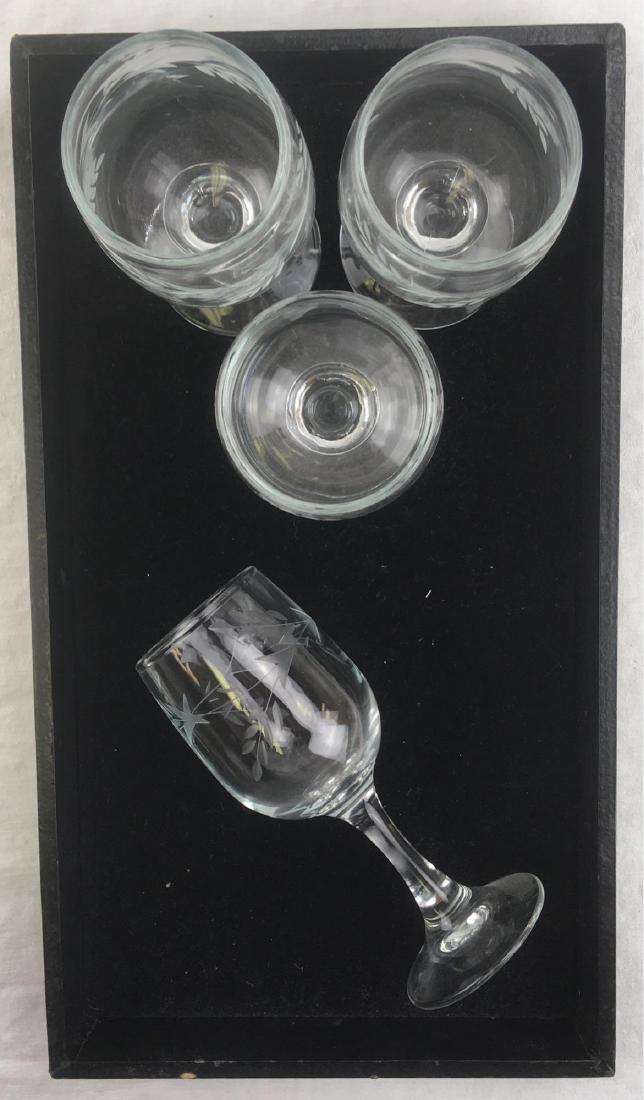 4 Etched White Wine Glasses and Carafe: 4 Etched White Wine Glasses and Carafe; this is a nice set, all in clearÂ glass showingÂ an etched laurel motif. All pieces are in very good condition. Each glass measures 6 1/4" H