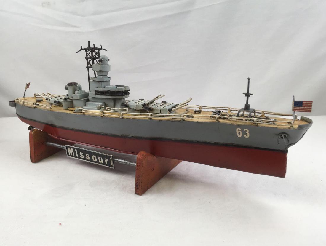 Ships Model, USS Missouri Battleship: Ships Model, USS Missouri Battleship; a metal model on stand, this model shows a vintage crafted appearance by design. It is in very good condition. The model measures 4" beam, 22 1/2" length overall 