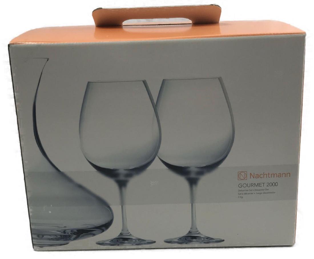 Nachtman Gourmet 2000 Wine Decanter Set: Nachtman Gourmet 2000 Wine Decanter Set, very clean and sleek, condition is like new, two glasses each measuring 9" H x 4" DIA, decanter measuring 10" H x 8" DIA, original packaging measuring 13" W x 
