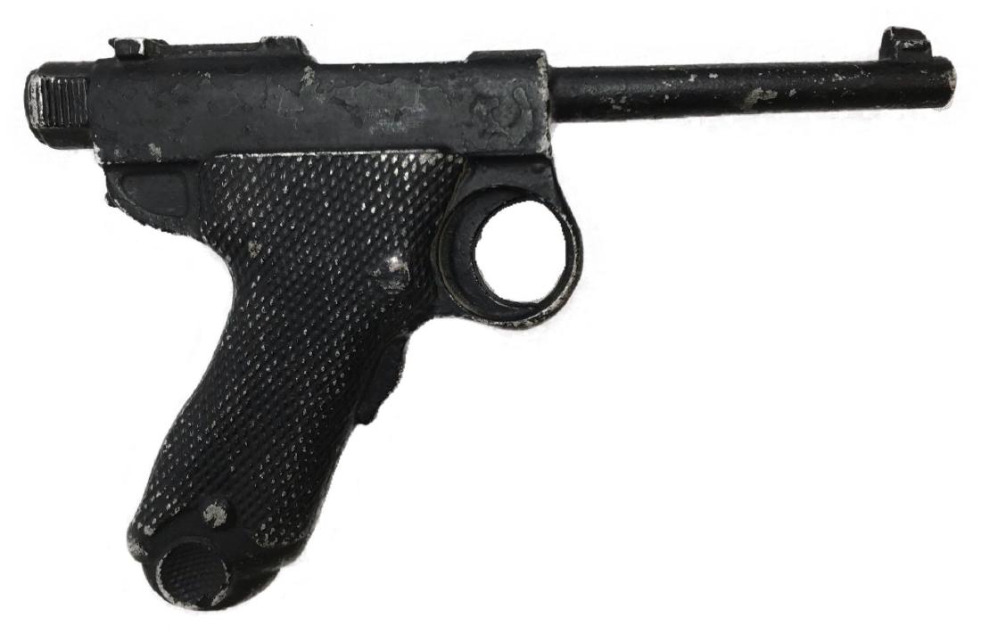 Lytle Nambu Cast Black Model Exhibition Pistol: Lytle Novelty Company cast aluminum toy pistol of a Japanese Nambu. This non-firing replica-toy was made by the above company in the 40-50's. Their ads appeared in the back of Boys Life and Popular Me