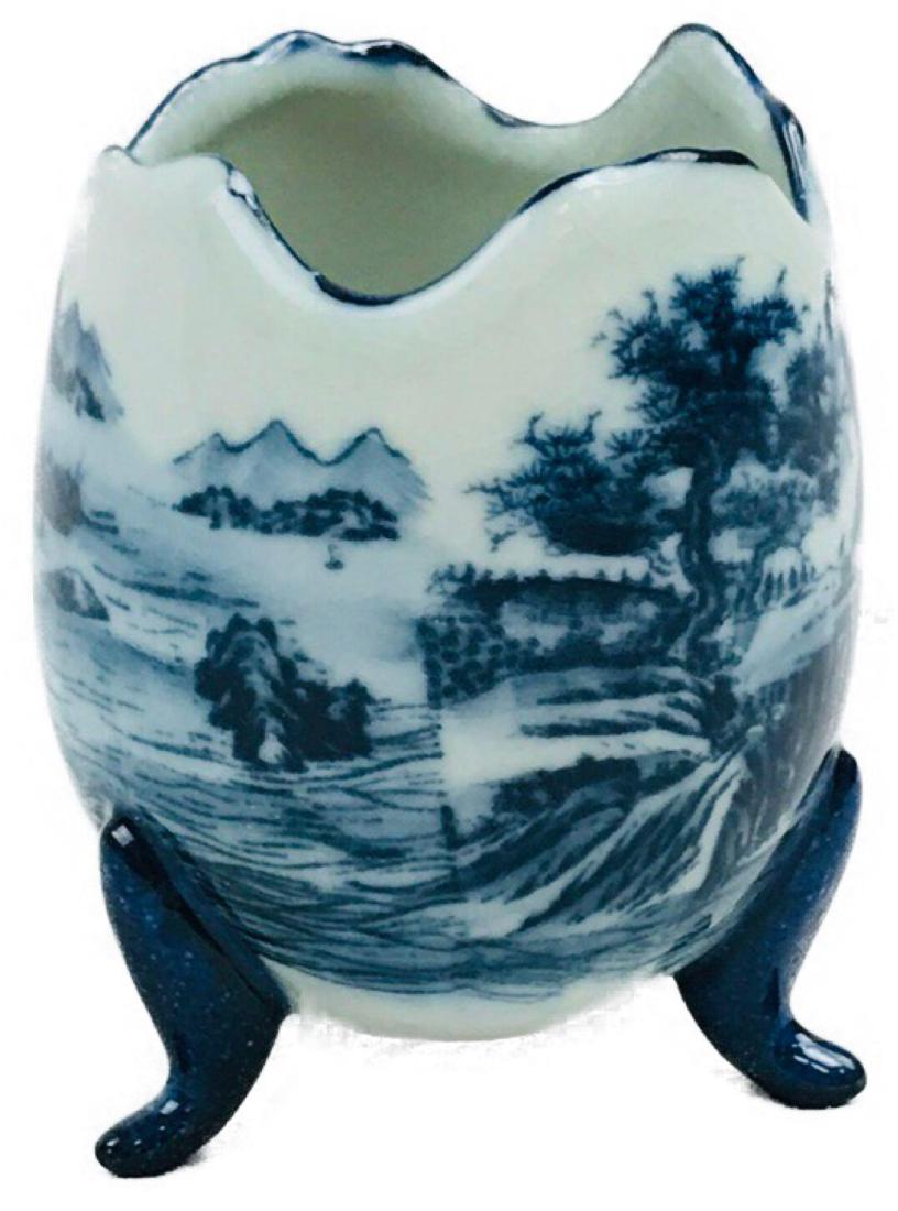 Vintage SATSUMA Ware, Small Cracked Egg Footed Vase: Vintage SATSUMA Ware, Small Cracked Egg Footed Vase; a nice little vase in blue and white, marked "SATSUM". The vase shows a nature scene. It is in good condition, it does show a very small chip in th