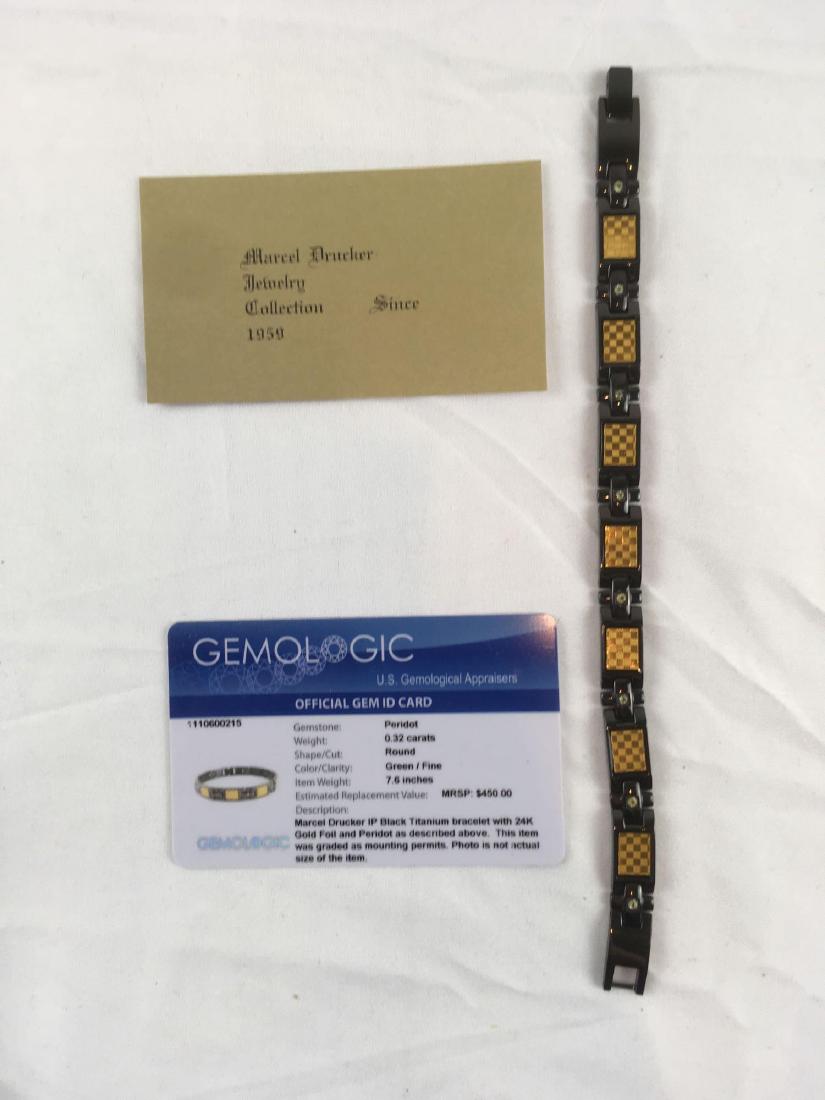 Vintage Marcel Drucker Peridot Bracelet, New in the Box: Vintage Marcel Drucker Peridot Bracelet, New in the Box;Â aÂ blackÂ titanium bracelet showingÂ peridot stonesÂ and 24 K gold foil. It is from the 1959