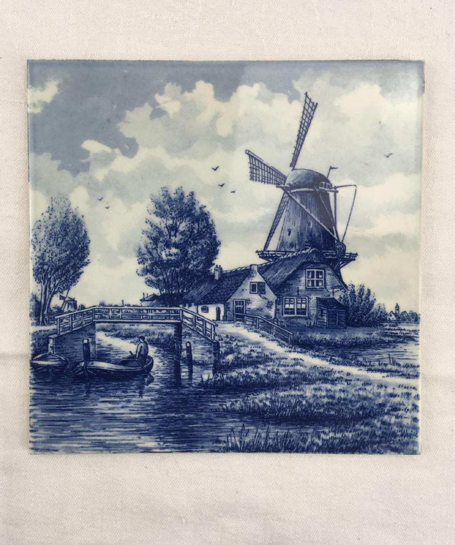 Delft Hand Painted Tile: Vintage Delft Hand Painted Tile; This piece was hand crafted in Holland and has three marks on the back. It is in great condition with no chipping or scratching and it measures at approximately 6" L x