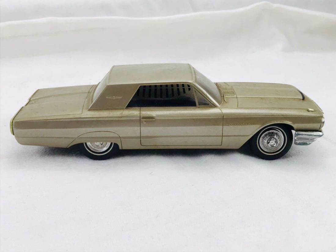 Vintage Philco AM Radio Mounted in a 1964 Model T Bird: Vintage Philco AM Radio Mounted in a 1964 Model T Bird; YES, you read this correctly. An AM radio in the shape of a 1964 Thunderbird, a Mid Century Modern masterpiece. It is marked. The model car is i