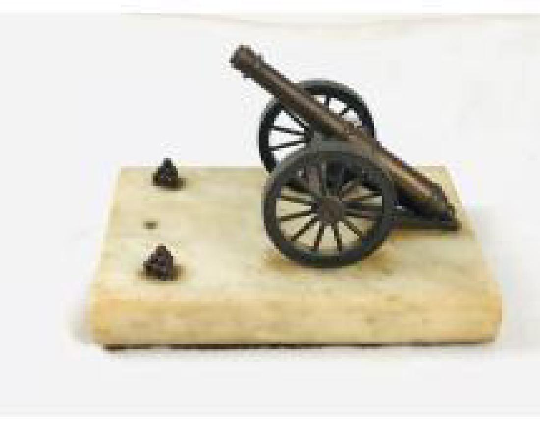Vintage Presentation Display of Miniature Brass Cannon: Vintage Presentation Display of Miniature Cannon; this display of a finelyÂ cast brass cannon sits on a marble bass. It shows two stacks of cannonballs. This piece is in fair condition as th