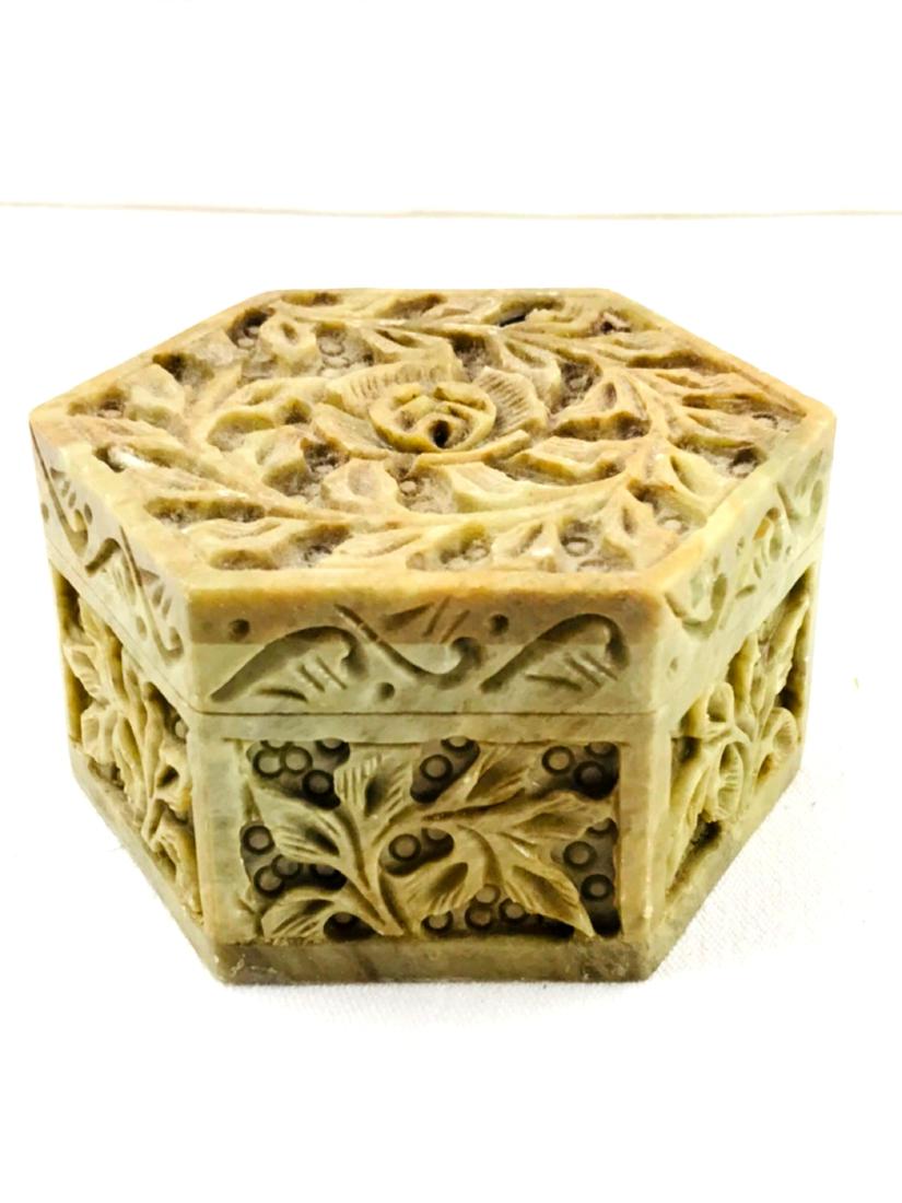 Vintage Carved Soapstone Trinket Box: OneÂ Vintage Carved Soapstone Trinket Box.Â It is a six sided hexagon shape with hinged lid and felt lining.Â It measures approximately 3.5" across and 2" tall.Â&#