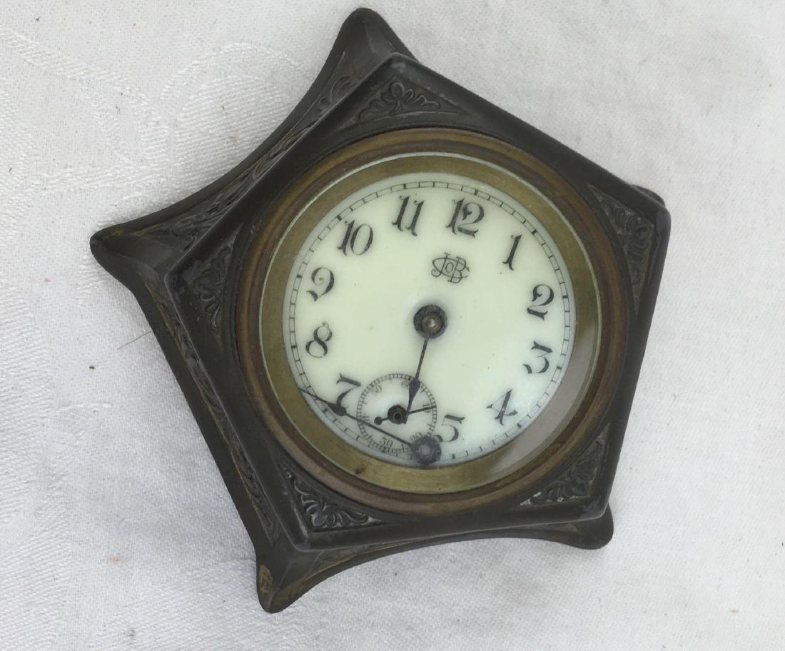 Antique Jennings Brothers Wind Up Desk Clock: Antique Jennings Brothers Wind Up Desk Clock; Very stylish turn of the century desk clock made with silver plate. The clock is no longer functional, the face is a little crooked and the long hand has 